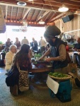 Dan tossing salad at Greater Goods.jpg